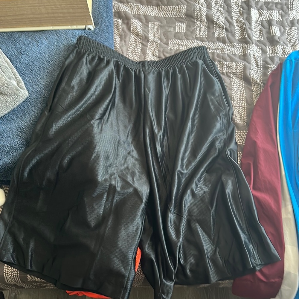 black shorts says large but fits an xl worn once